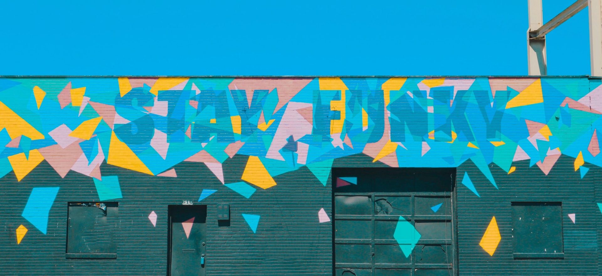 Street art reading "stay funky" summarizing lessons from Steal Like an Artist