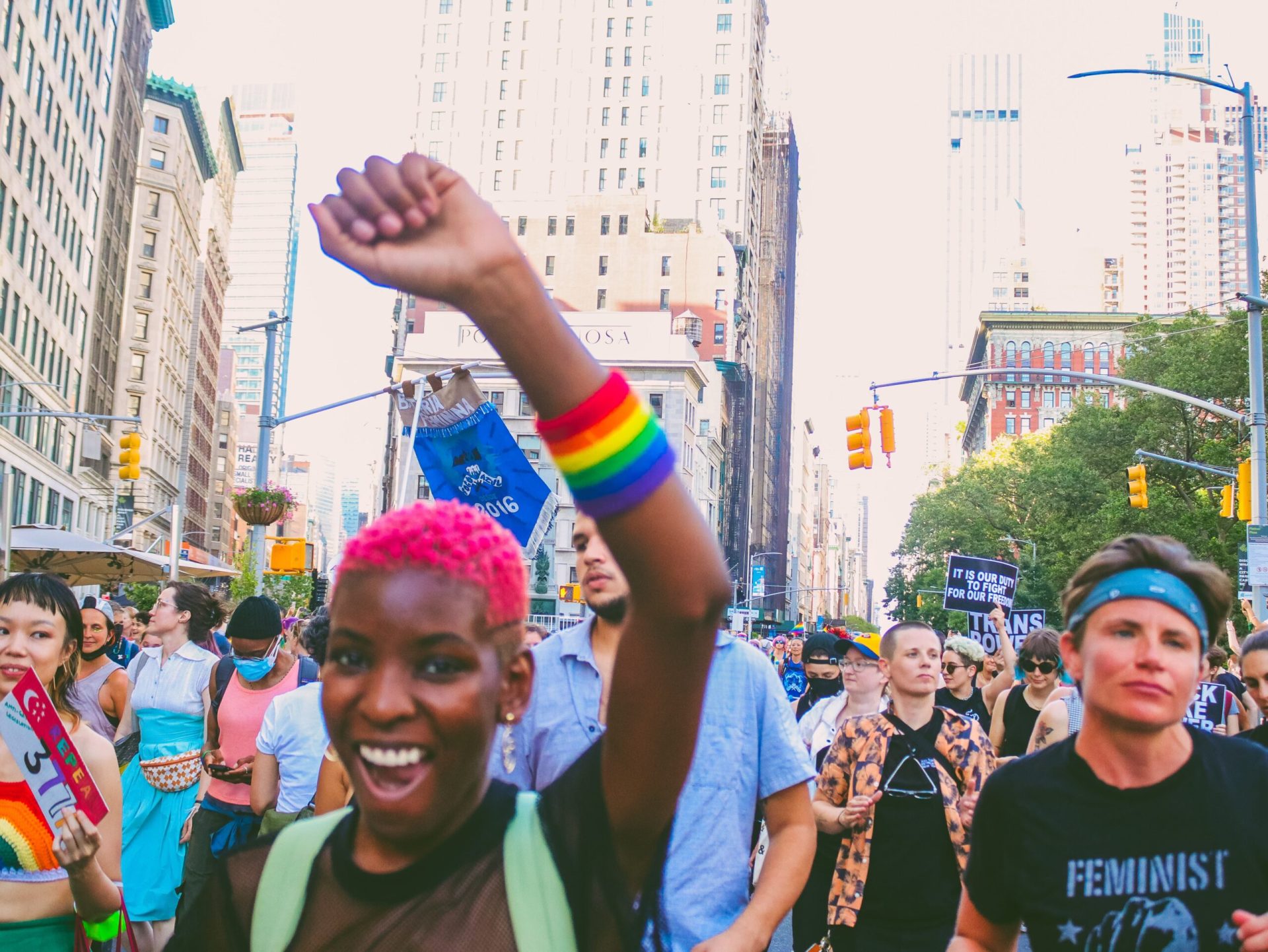 People marching in LGBTQ pride parade