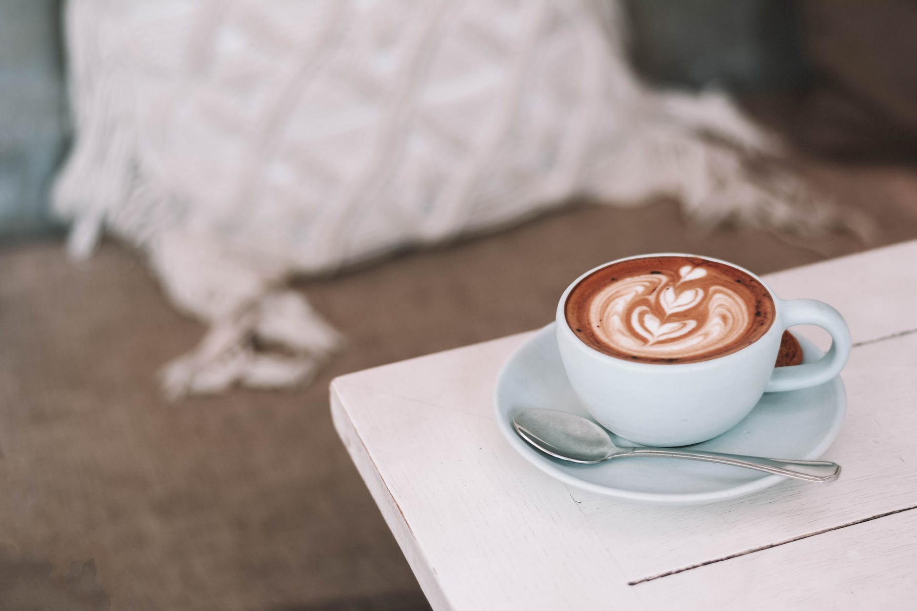 photo of white ceramic coffee cup